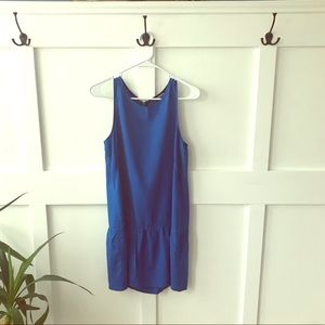 Sleeveless dress with babydoll bottom